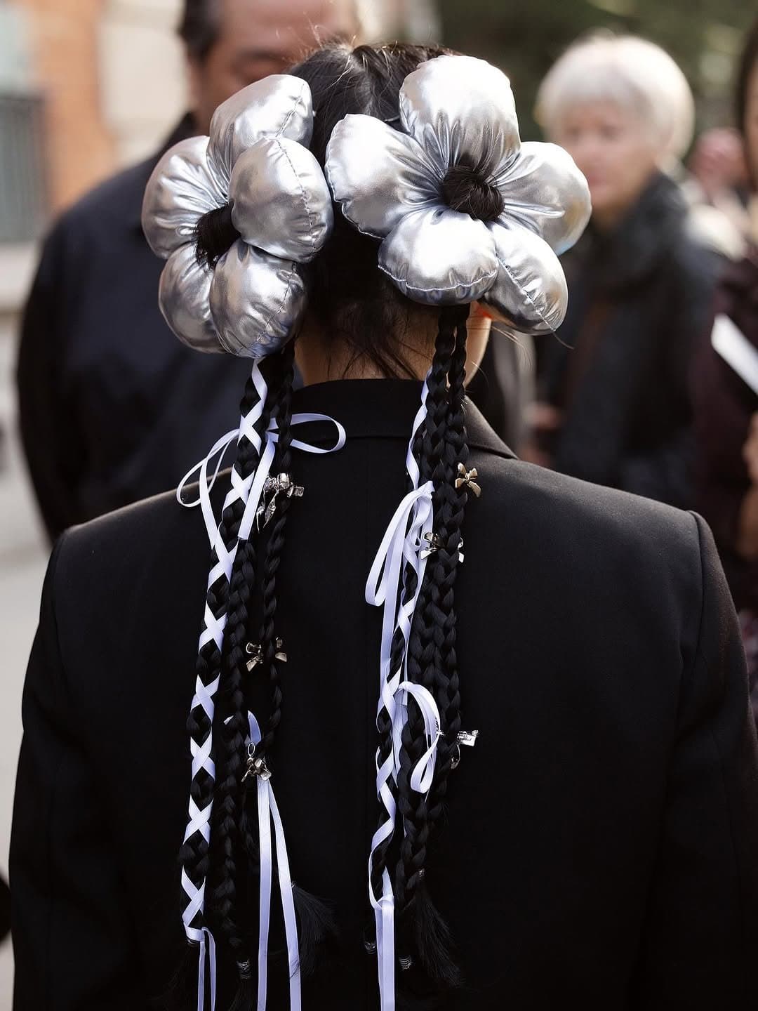 The flowers win;
the jacket just reports.