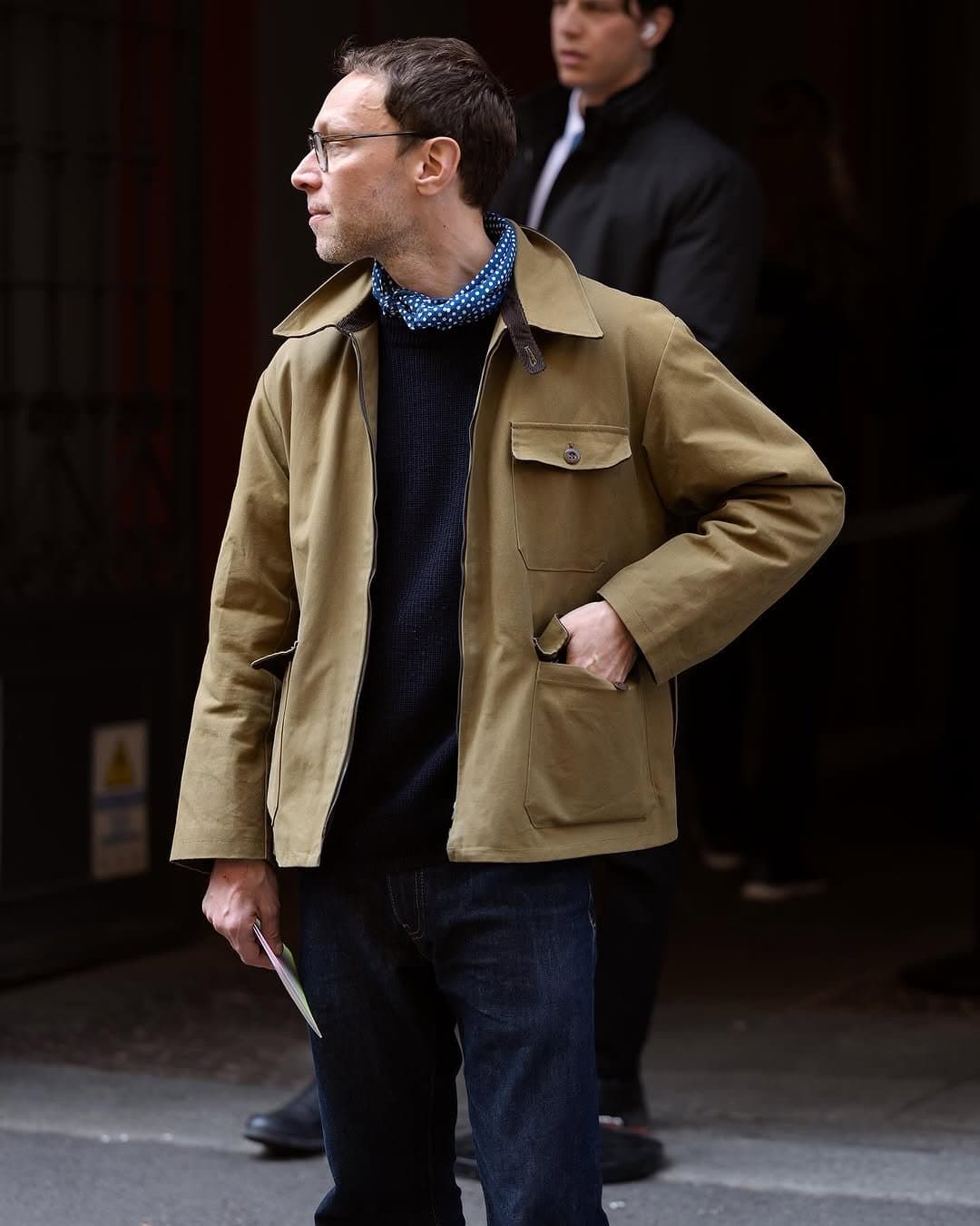 The scarf saves the chore coat
from museum-shop workwear.