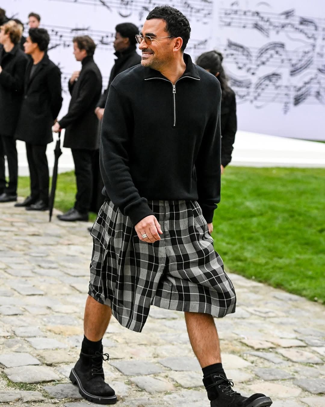 That plaid volume comes first,
and the black top obeys.