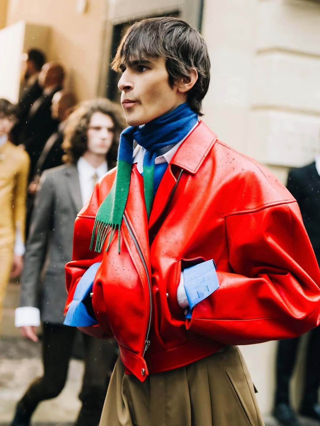 The red jacket buys the seat,
the cuffs prove the taste.