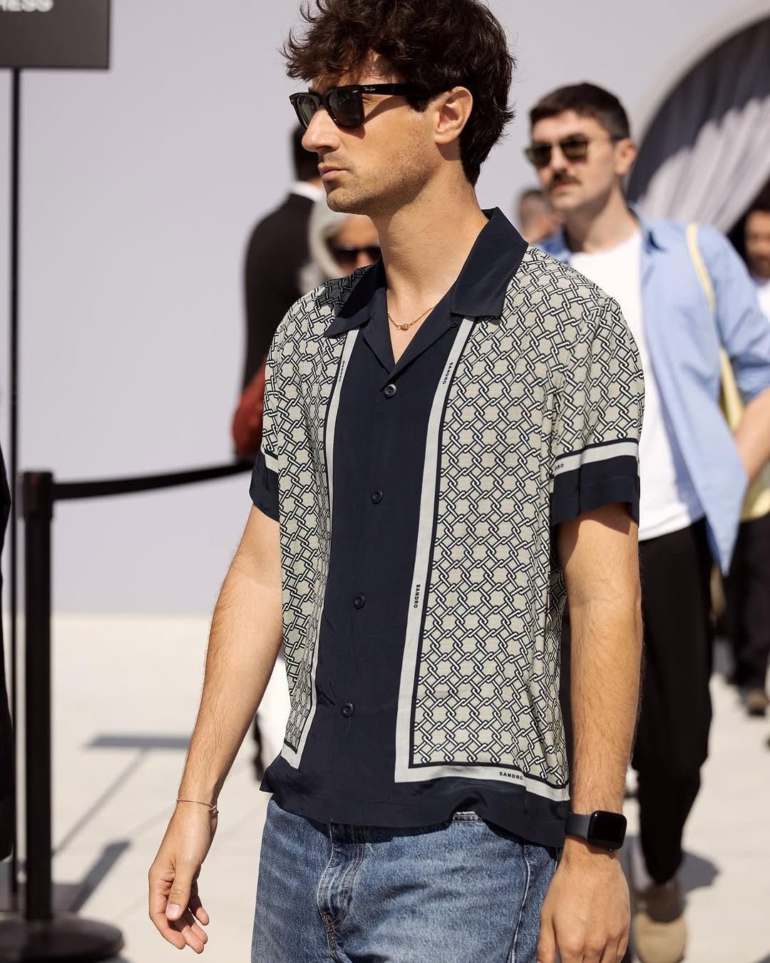 The shirt has the idea.
The watch breaks the spell.