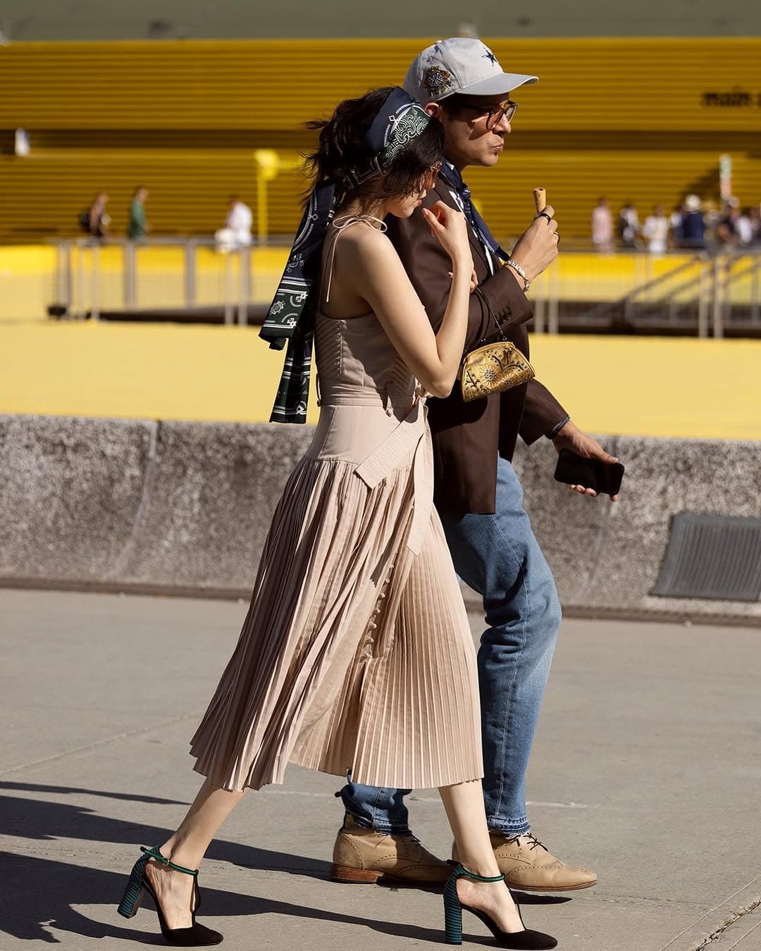 The scarf saves the dress.
The shoes finish the argument.