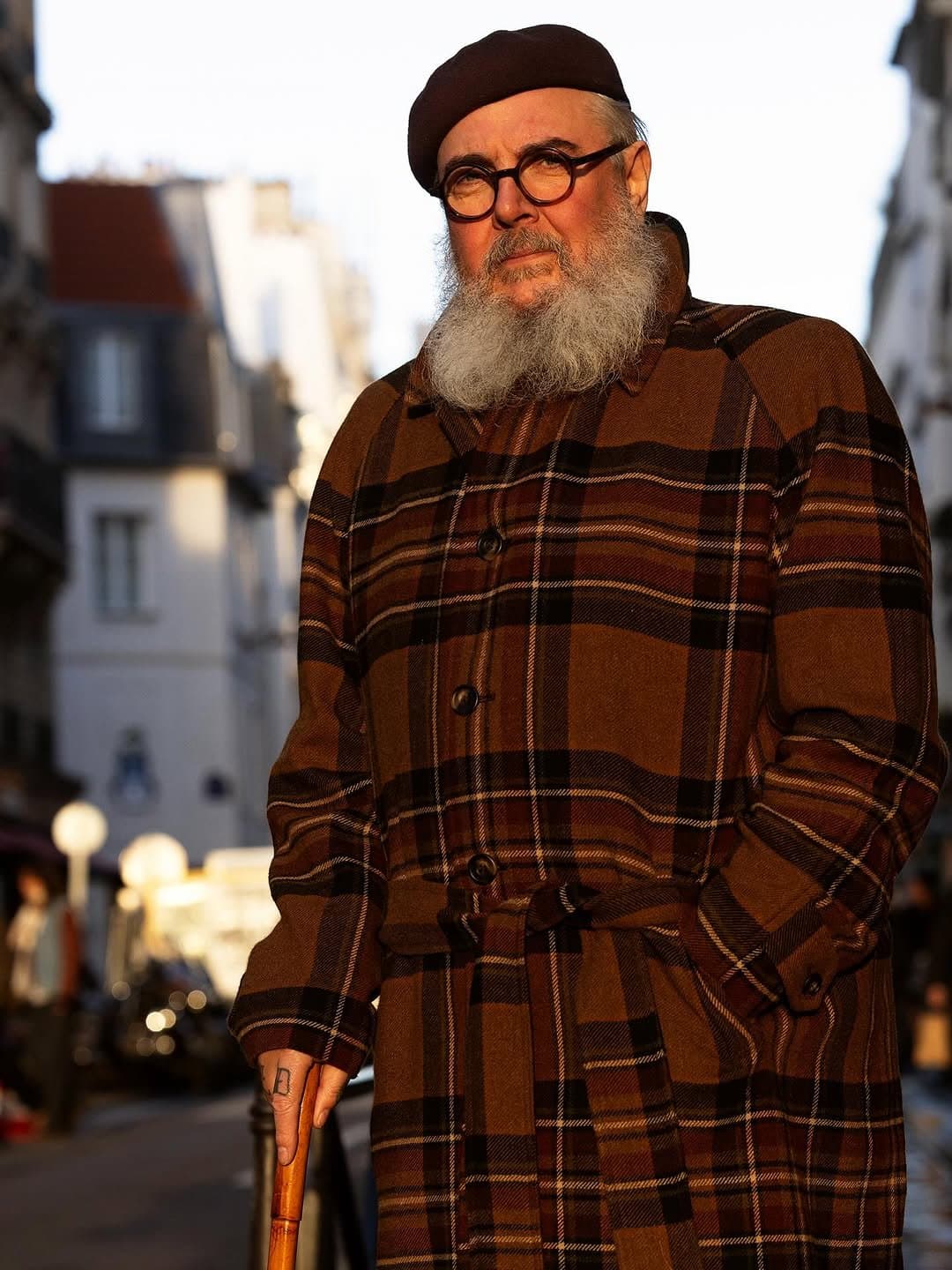 The coat is the argument.
The beret knows its place.