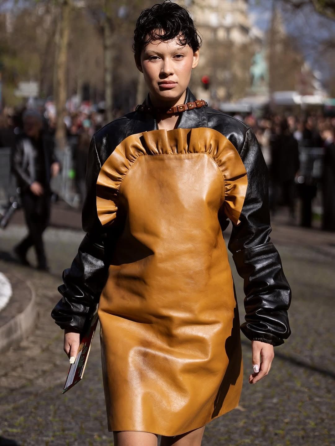 The leather ruffle wins,
then the sleeves overrule it.