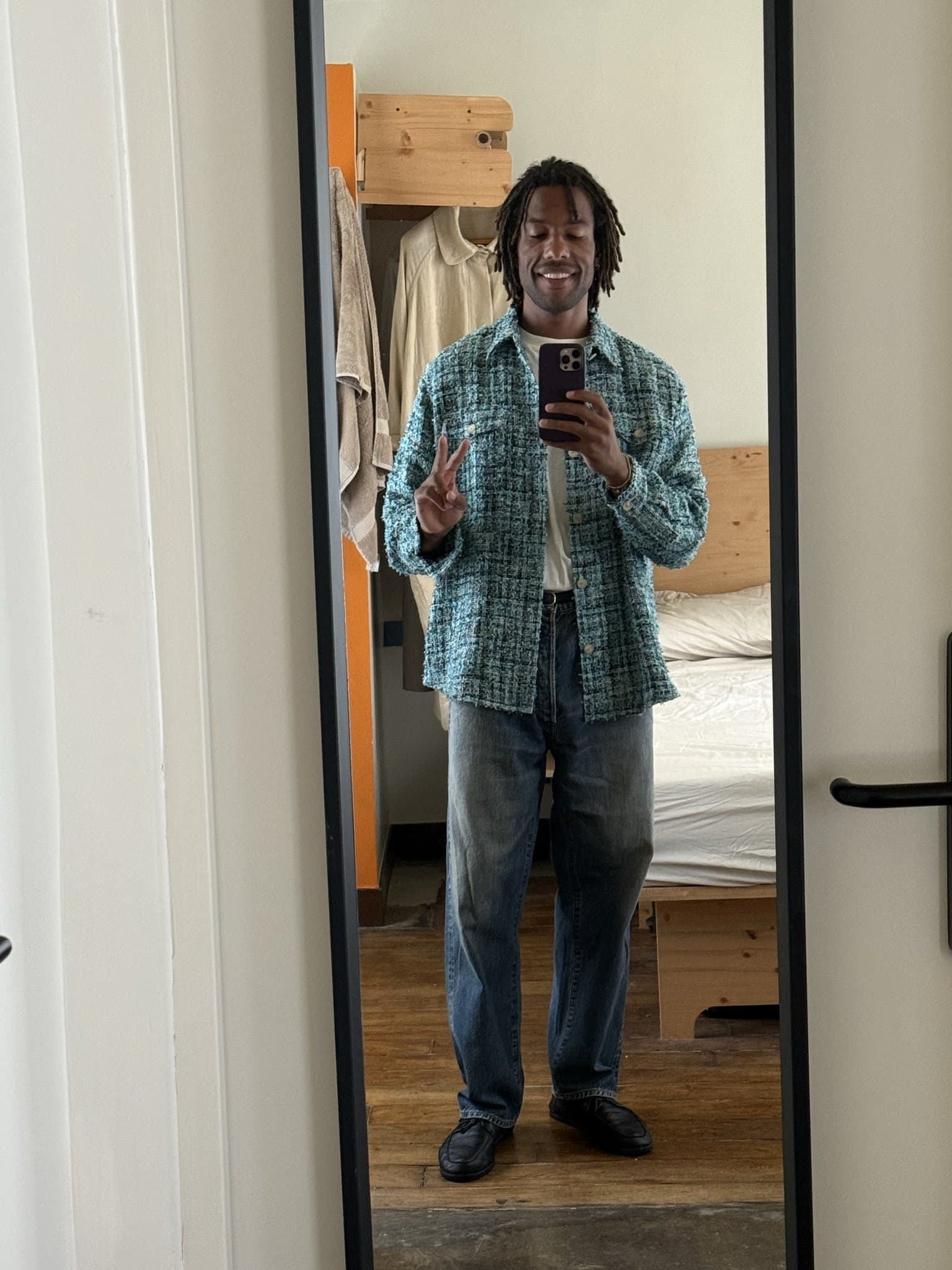 The teal overshirt runs it.
Do not over-style the rest.