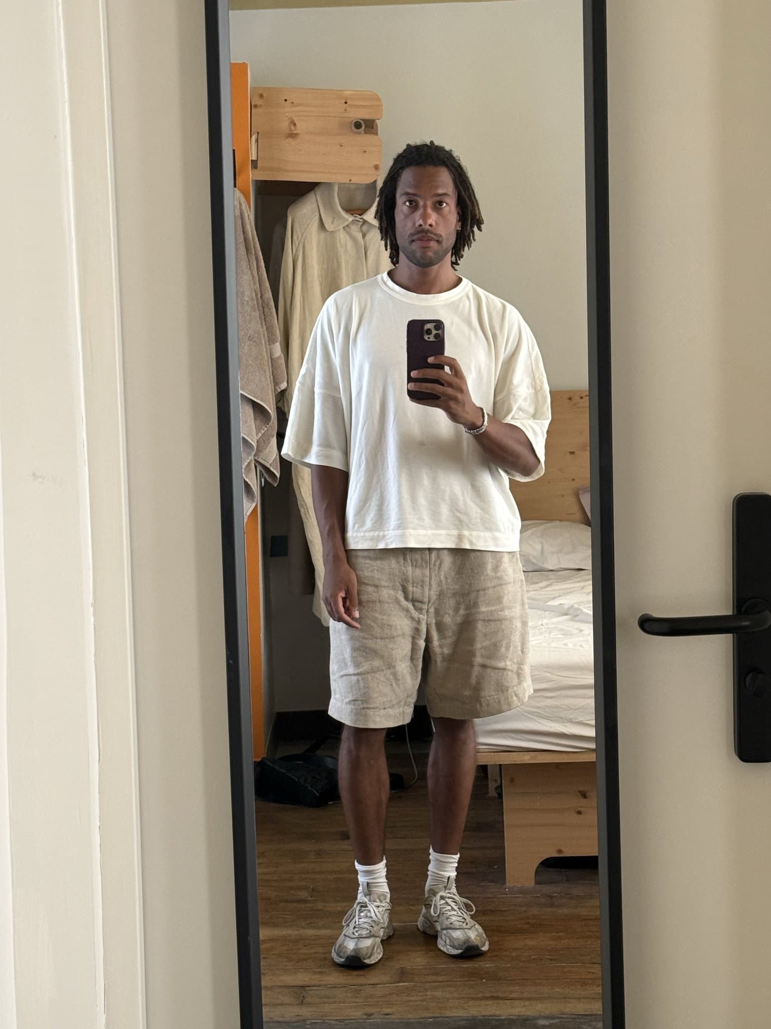 The basics are calm.
The sneakers do the damage.
