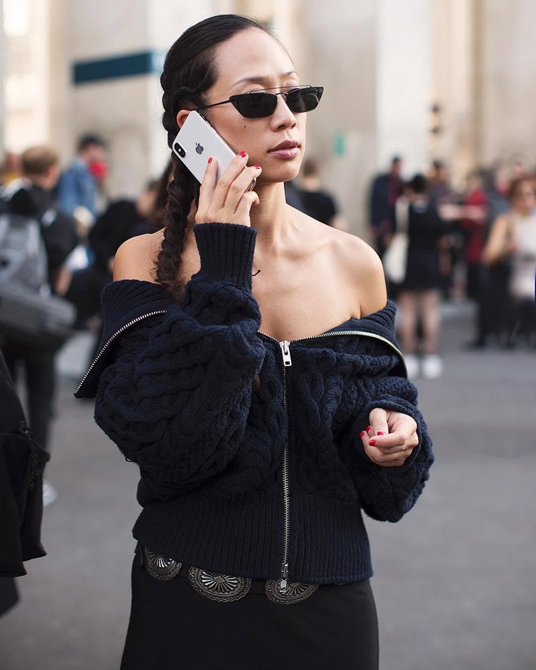 That heavy knit drops low,
and the whole street looks up.