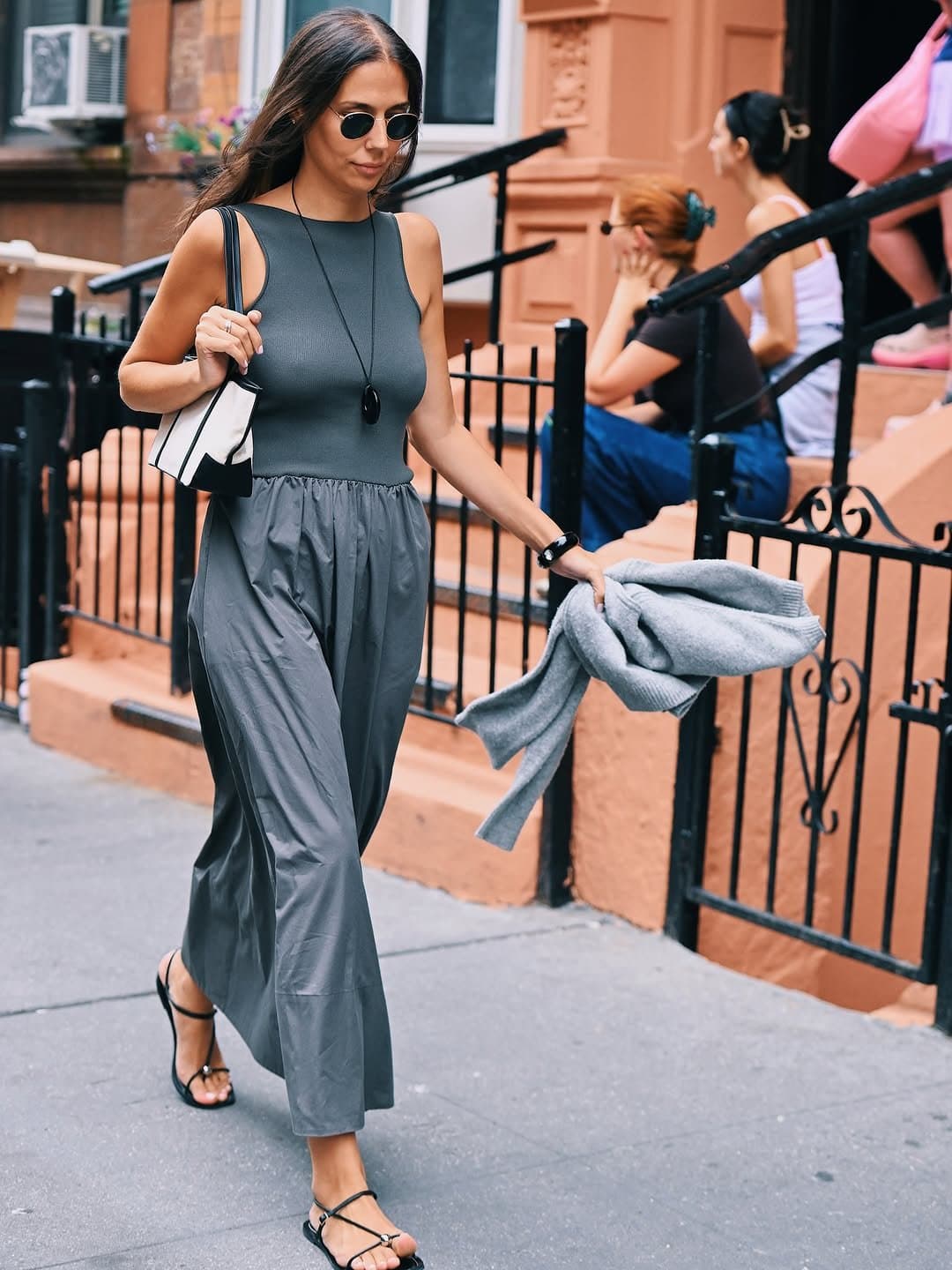 That gathered waist pulls
The whole grey spell tight.