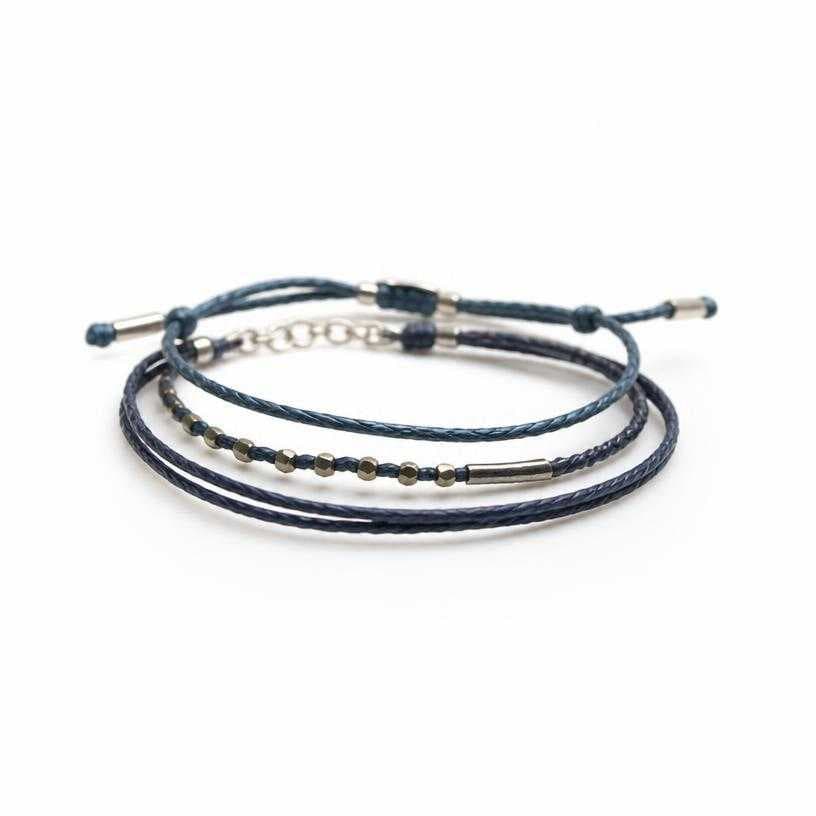 Generated item image of dark blue stacked cord and metal bracelets